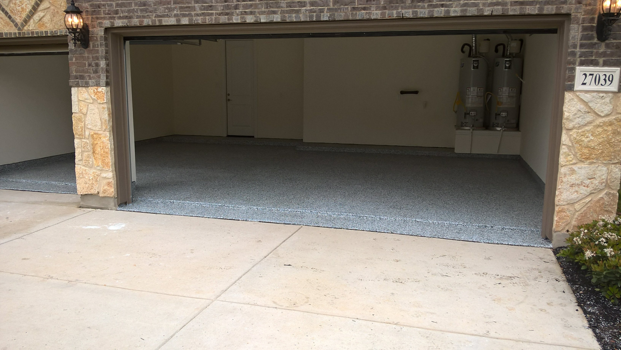 Completed AmazaCrete decorative flake garage floor